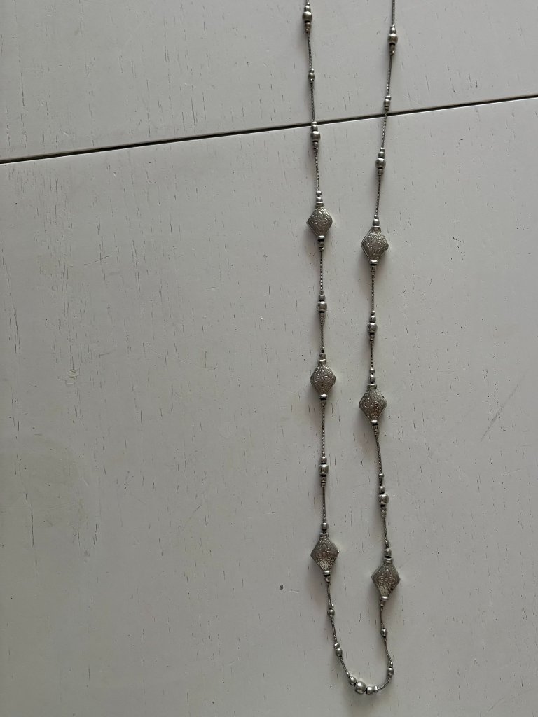 Elegant Long Silver Necklace With Diamond-Shaped Charms